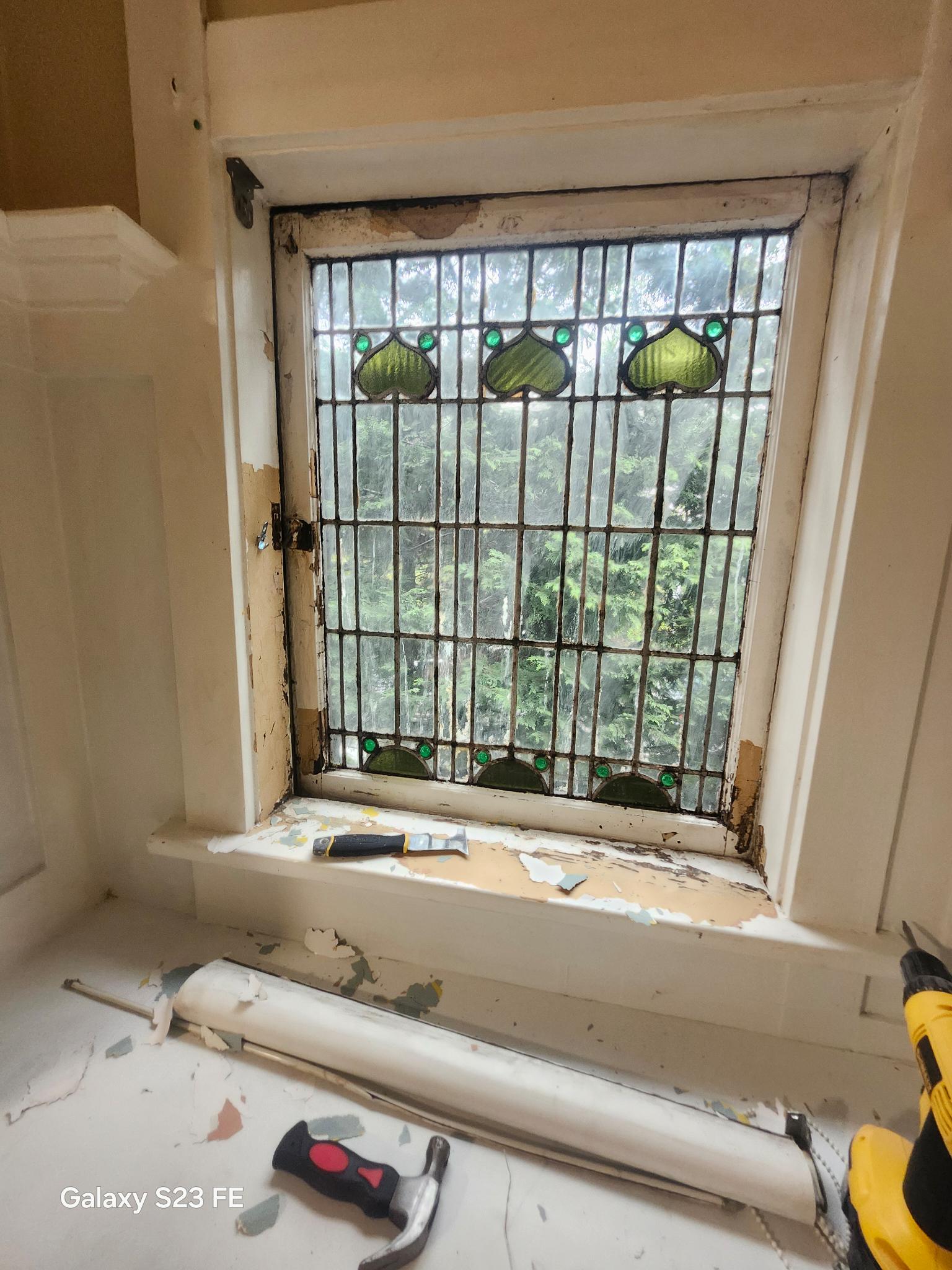 Stained glass window carpentry restoration